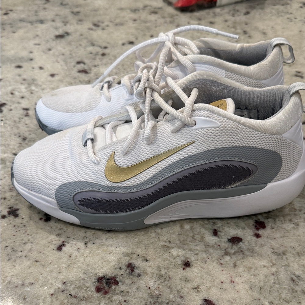 Nike White Sneakers with Gold Swoosh and Gray Accents
